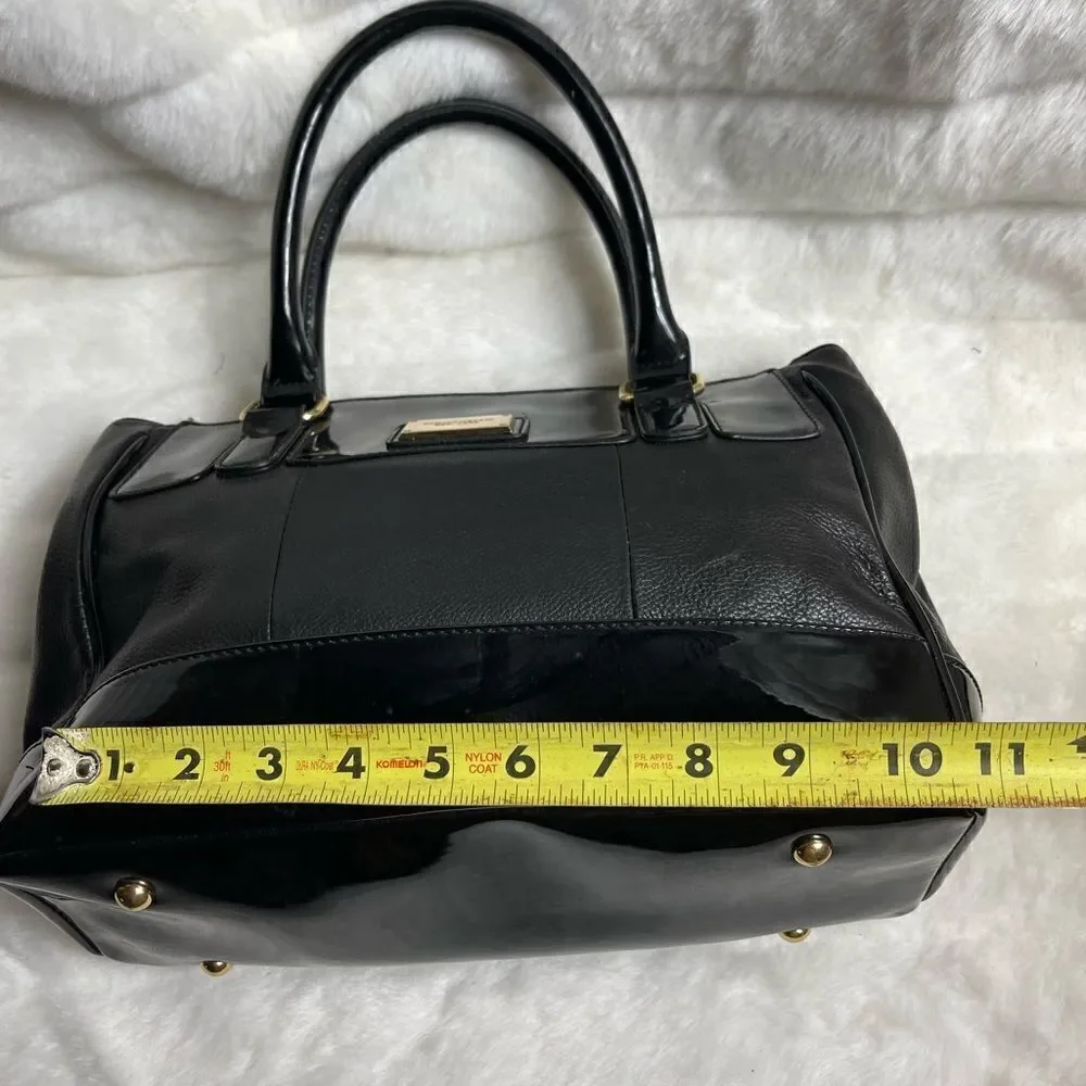 Tignanello black leather shoulder bag with gold tone hardwares